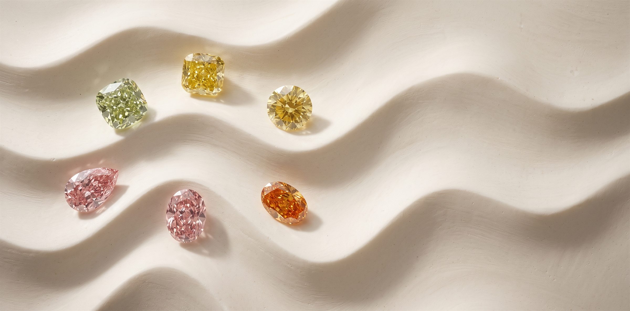 Pierres nues de couleur posées à plat